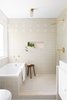 Modern home with Bath Room, Ceramic Tile Floor, Ceiling Lighting, Vessel Sink, Alcove Tub, and Ceramic Tile Wall. A glimpse into the master bath covered in tile by Heath Ceramics. Photo 8 of Federal Bungalow