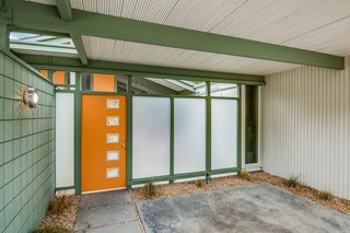 A new door is paired with frosted glass to preserve privacy while allowing light to pass through.