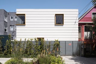 “I find that what's so appealing about old Victorian trim detail is how it casts shadows, and so we played with that idea in the detailing of the new house, creating rhythm with the shadow lines of the lap siding and the window extrusions,” notes Ryan.