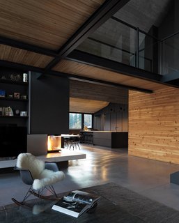 "The clients requested we use ‘cirmolo,’ a local type of wood with a strong fragrance capable of spreading healthy aromas around the house," say the architects. They used the timber, also known as Swiss pine, for accent walls and the majority of the custom furniture.