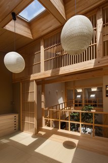 A pair of DAIKO LED pendant lamps are located in the tatami room.