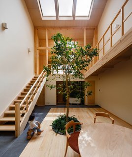 "The column-less, double-height living room is unusually big and open compared to most Japanese houses," says Chikamori. "It's thanks to the structural engineers, who are experts on a relatively new technique for building wooden, rigid-frame structures."