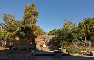 A Japanese-style outdoor bathing area with a tub and shower sits on the property.