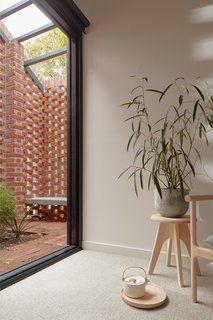 In the one Bardolph Gardens unit, every bedroom has access to a private courtyard. The other unit features a shared courtyard space.