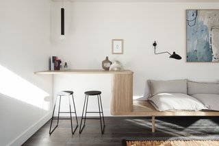 This stand-up study nook with built-in storage can also be used as a bar.