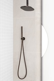 All the tapware is by Sussex Scala, and the finish is Living Rustic Bronze.