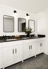 Modern home with Bath Room, Concrete Floor, Granite Counter, Undermount Sink, and Wall Lighting. The three shared "wash closets" are stylishly appointed with black granite countertops and Cedar and Moss wall lights. The honed concrete floors throughout the building are equipped with radiant heating. Photo 6 of Cache House