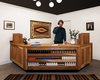 An oiled white oak reception desk welcomes guests to the lobby, where they can also enjoy complimentary Snake River Roasting Co. coffee. Photo 3 of Cache House modern home
