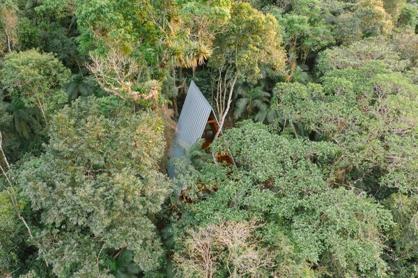Located 15 minutes from the small coastal town of Paraty in southeast Brazil, the property includes nearly a quarter-mile of waterfront with natural pools and waterfalls as well as hiking trails.