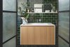 Modern home with Bath Room, Subway Tile Wall, Quartzite Counter, Ceramic Tile Wall, Enclosed Shower, Undermount Sink, and Ceramic Tile Floor. The neutral color scheme is repeted in various shades throughout the entire apartmant, echoing the verdant outdoors and creating a soft backdrop for an eclectic variety of items and furniture. Photo 11 of C Studio Apartment