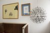 Modern home with Living Room and Pendant Lighting. Contemporary metal globe pendant light juxtaposes unique original artwork. Photo 15 of Colorful & Eclectic Danish Home