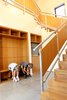 Modern home with Staircase, Wood Tread, and Metal Railing. Mudroom and Stairs Photo 7 of Before House