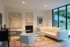 Modern home with Living Room, Bench, Chair, Sofa, Coffee Tables, Recessed Lighting, Concrete Floor, and Ribbon Fireplace. Living Room Photo 4 of Before House
