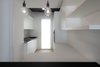 Modern home with Kitchen, Quartzite Counter, Laminate Cabinet, Medium Hardwood Floor, Ceramic Tile Backsplashe, and Pendant Lighting. Kitchen Photo 5 of D House