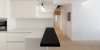Modern home with Living Room, Bar, Desk, Ceiling Lighting, Pendant Lighting, and Medium Hardwood Floor. Open space Photo 8 of D House