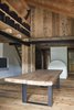 Modern home with Living Room, Table Lighting, Medium Hardwood Floor, and Corner Fireplace. Dining room Photo 12 of Renovation of an Alpine Barn