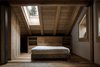 Modern home with Bedroom, Bed, and Medium Hardwood Floor. Bedroom Photo 19 of Renovation of an Alpine Barn