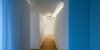 Modern home with Staircase and Wood Railing. Interior Photo 10 of PD House
