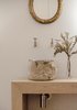 Modern home with Bedroom, Ceiling Lighting, and Light Hardwood Floor. In the main bedroom there is a bespoke vanity in oak with a basin crafted from locally sourced stone Photo 9 of The Oak Residence by Quiet Studios