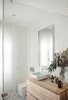 Modern home with Wood Counter and Ceiling Lighting. Wood and glass fittings in the main Photo 11 of The Oak Residence by Quiet Studios