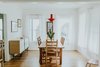 Modern home with Dining Room, Light Hardwood Floor, Pendant Lighting, and Table. Dining Room Photo 3 of Oak Cliff Home