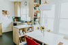 Modern home with Kitchen, Engineered Quartz Counter, Wood Cabinet, Linoleum Floor, Ceramic Tile Backsplashe, Pendant Lighting, and Undermount Sink. Nook and Kitchen Photo 5 of Oak Cliff Home