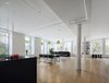 Modern home with Dining Room. We replaced the windows and concealed the heating units to maximize the distribution of natural light. Photo 3 of Spring Street Loft