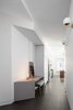Modern home with Hallway. A built in desk serves as a landing zone before entering the main living area. Photo 3 of 5th Avenue Apartment