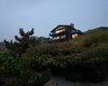 Modern home with Exterior, Gable RoofLine, Wood Siding Material, Beach House Building Type, and Shingles Roof Material. View of the house from the dunes along the beach. Photo 2 of Waterfront House