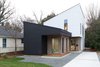 Modern home with Exterior, House Building Type, Shingles Roof Material, Brick Siding Material, Shed RoofLine, Concrete Siding Material, and Metal Roof Material. exterior street view Photo of 1908 Oaklawn