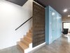 Modern home with Staircase, Wood Tread, and Metal Railing. utility core and stairs Photo 7 of 1908 Oaklawn