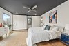 Modern home with Bedroom, Wardrobe, Medium Hardwood Floor, Ceiling Lighting, Bed, and Storage. master bed room Photo 10 of 1908 Oaklawn