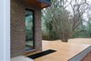 Modern home with Exterior, Brick Siding Material, and House Building Type. back deck Photo 17 of 1908 Oaklawn