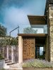 Modern home with Outdoor, Back Yard, Garden, Stone Patio, Porch, Deck, Metal Fences, Wall, and Landscape Lighting. Exterior-VILLA CP Photo of Villa CP