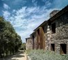 Modern home with Outdoor, Front Yard, Trees, Walkways, Stone Fences, Wall, and Metal Fences, Wall. Exterior-VILLA CP Photo 5 of Villa CP