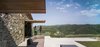 Modern home with Outdoor, Back Yard, Trees, Woodland, Swimming Pools, Tubs, Shower, Infinity Pools, Tubs, Shower, Large Patio, Porch, Deck, Wood Patio, Porch, Deck, Stone Patio, Porch, Deck, Decking Patio, Porch, Deck, and Stone Fences, Wall. Exterior-VILLA CP Photo 7 of Villa CP
