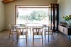 Modern home with Dining Room, Chair, Table, Bar, Ceiling Lighting, and Concrete Floor. Dinning room-VILLA CP Photo 14 of Villa CP