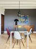 Modern home with Dining Room, Ceiling Lighting, Chair, Light Hardwood Floor, Lamps, Pendant Lighting, and Table. Creueta House-Dinning room. Photo 7 of Creueta House