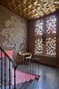Modern home with Hallway and Dark Hardwood Floor. Entrance hall with original art from the 50's made by original owner. Photo 4 of Creueta House