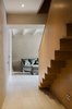 Modern home with Staircase, Wood Railing, and Wood Tread. Duplex in Gracia-staircase detail Photo 7 of Duplex in Gracia