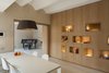 Modern home with Dining Room, Light Hardwood Floor, Table, Wall Lighting, Chair, Ceiling Lighting, Lamps, and Accent Lighting. Duplex in Gracia Photo 3 of Duplex in Gracia