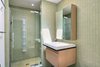 Modern home with Bath Room, Stone Counter, Wall Mount Sink, Enclosed Shower, Corner Shower, Glass Tile Wall, and Ceiling Lighting. Home features two ensuite baths Photo 6 of The Hill Gowdy House