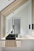 Modern home with Bath Room, Wood Counter, Light Hardwood Floor, and Vessel Sink. The second floor powder room. Photo 2 of Eel Point Road Residence