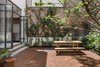 Modern home with Outdoor, Back Yard, Trees, Shrubs, Raised Planters, Gardens, and Small Patio, Porch, Deck. backyard patio Photo 10 of Casa Milton