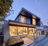 Modern home with Exterior, House Building Type, Wood Siding Material, Brick Siding Material, Flat RoofLine, and Glass Siding Material. Rear Elevation Photo 3 of Brennan Avenue Residence