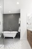 Modern home with Bath Room, Two Piece Toilet, Ceramic Tile Floor, Freestanding Tub, Enclosed Shower, Ceramic Tile Wall, Marble Counter, and Undermount Sink. new master bathroom Photo 4 of Roanoke Park Residence