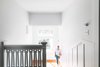 Modern home with Staircase, Wood Tread, and Wood Railing. enhanced traditional stairway Photo 11 of Roanoke Park Residence