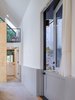 Modern home with Hallway and Concrete Floor. A dutch door completes a hallway leading Granny through her space. Photo 6 of Granny Pad