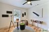 Modern home with Office, Study Room Type, Chair, Bookcase, Desk, Lamps, and Light Hardwood Floor. The casual home office with cork boards and desk and book shelf by designATplay. Photo 18 of The Vickery Home
