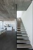 Modern home with Staircase, Concrete Tread, and Glass Railing. Stairs Photo 6 of La Iluminada